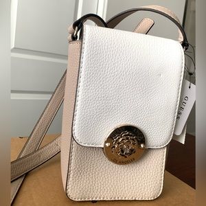 Brand new GUESS small crossbody bag. Never worn. Tag still attached